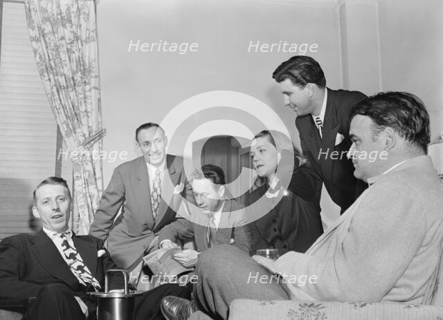 Portrait of Stan Kenton, Carlos Gastel, and Bob Gioga, New York, N.Y., 1947 or 1948. Creator: William Paul Gottlieb.