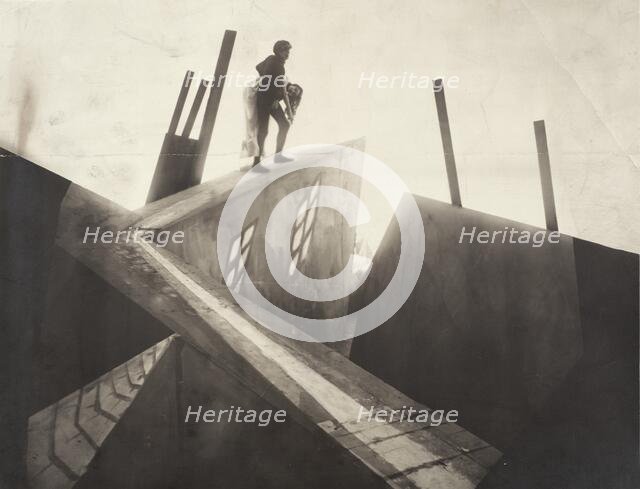 Untitled (Cesare [Conrad Veidt] Carrying Jane [Lil Dagover] across Rooftops), 1919. Creator: Anon.
