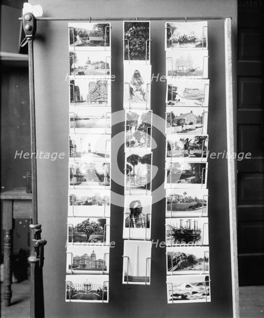 Wire postcard display rack, between 1900 and 1910. Creator: Unknown.
