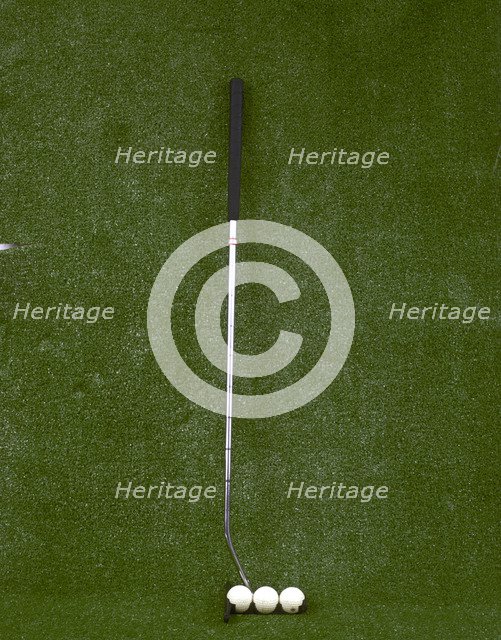 Modern-style golf club and three balls, late 20th century. Artist: Unknown
