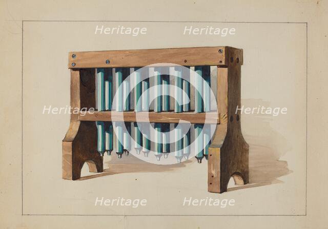 Rack with Candle Molds, c. 1935. Creator: Charles Caseau.