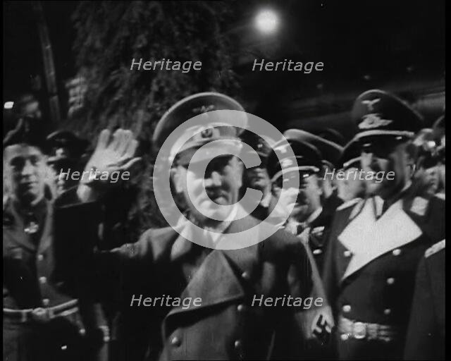 Adolf Hitler, the German Leader with Arm Raised in Salute With Various Male..., 1937. Creator: British Pathe Ltd.