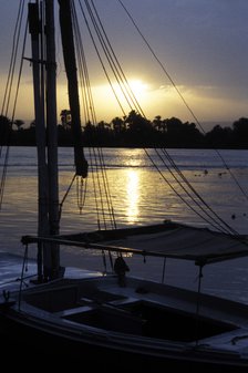 An anchored felucca on the River Nile at sunset. Artist: Unknown
