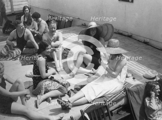 Passengers sunbathing on board a cruise ship, c1920s-c1930s(?). Artist: Unknown