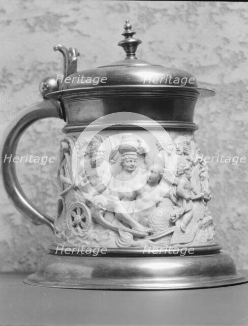Beer stein decorated with relief carvings of mythological figures, 1923 Creator: Arnold Genthe.