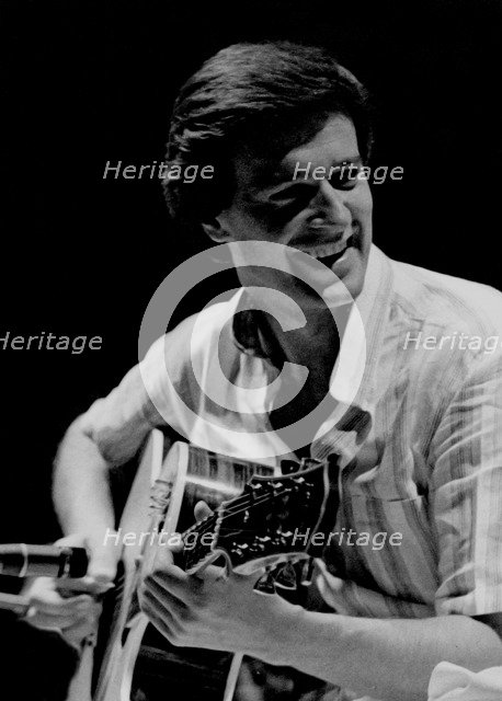 John McLaughlin,  jazz guitarist, bandleader and composer, London , 1976. Artist: Brian O'Connor.