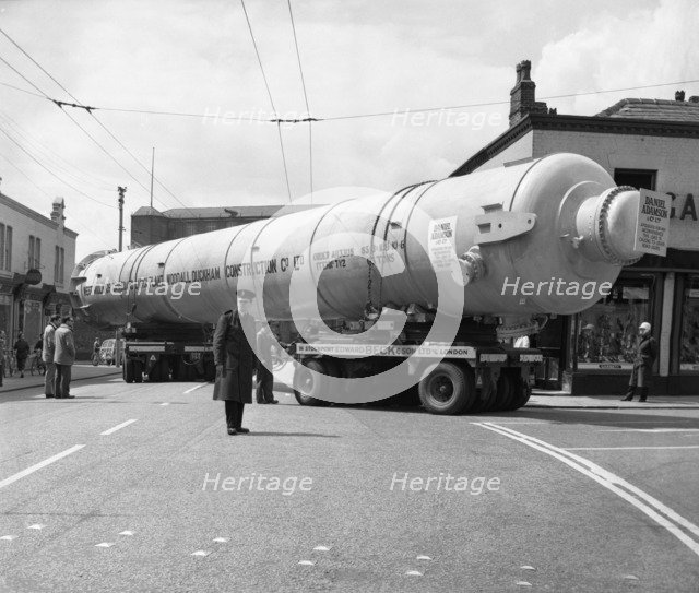 A heavy load stops the Manchester traffic, 1962.  Artist: Michael Walters