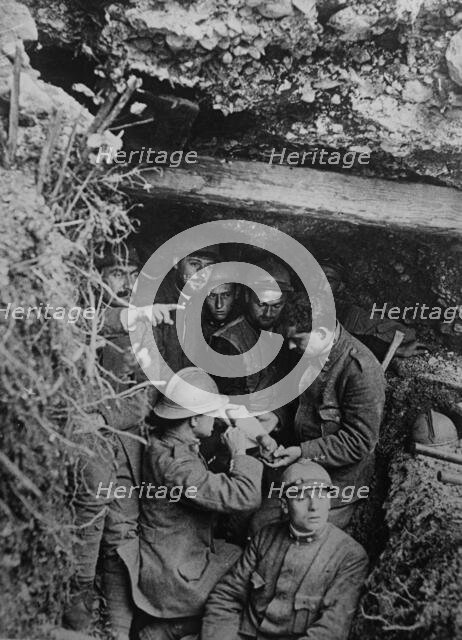 Bandaging wounded, between c1915 and c1920. Creator: Bain News Service.