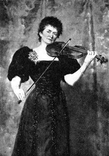 Pictures from the Royal Academy: Lady Hallé (Madame Norman Neruda) - Hon. J. Collier, 1895. Creator: George Meisenbach.