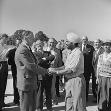 Harold Watkinson, shaking hands with labourer J. Singh, during a visit.., 07/09/1959. Creator: John Laing plc.