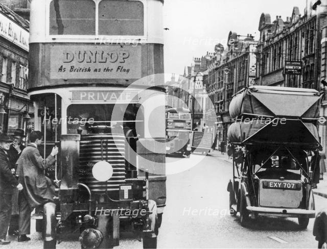 World War 2 street scene show gas converted vehicles. Creator: Unknown.