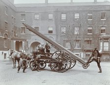 Firemen demonstrating a horse-drawm escape vehicle, London Fire Brigade Headquarters, London, 1910. Artist: Unknown.