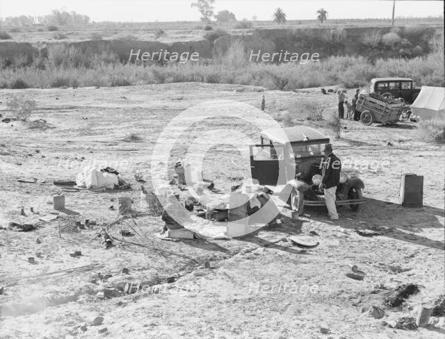 Migratory families at 7 a.m. near Imperial Valley, California, 1939. Creator: Dorothea Lange.