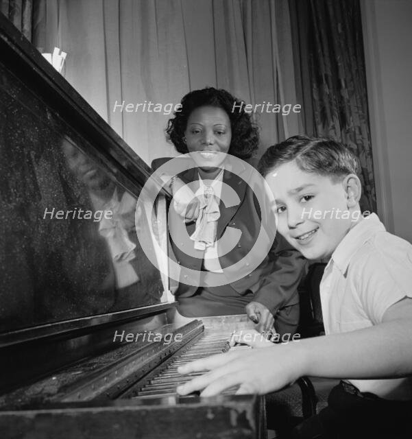 Portrait of Mary Lou Williams and Roger Barnet, Waldorf-Astoria, Suite 4-B, New York, N.Y., 1947. Creator: William Paul Gottlieb.