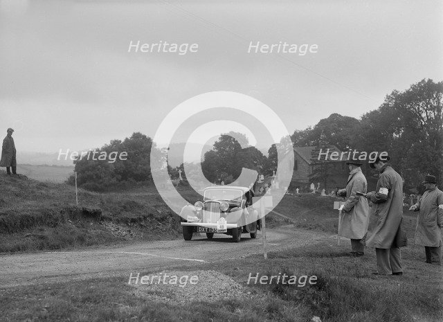 Jaguar SS saloon of HT Lewis competing in the South Wales Auto Club Welsh Rally, 1937 Artist: Bill Brunell.