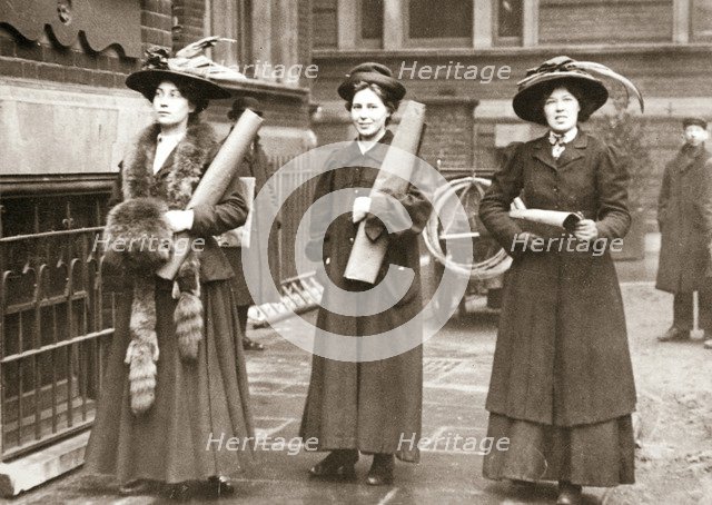 Suffragettes armed with materials to chain themselves to railings, 1909. Artist: Unknown
