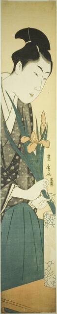 Young man arranging irises in a vase, n.d. Creator: Utagawa Toyohiro.
