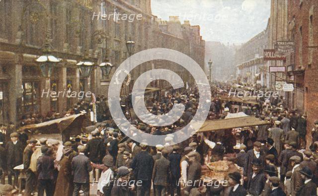Petticoat Lane market on a Sunday morning, London, c1910. Creator: Unknown.