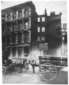 View of land to let in Arthur Street East with two horse-drawn carts in front, City of London, 1887. Artist: Henry Dixon