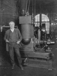 Thomas Alva Edison, American inventor, with his first dynamo for producing electric light, 1880s. Artist: Unknown