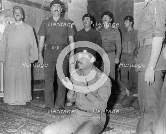 Saddam Hussein praying, Karbala, Iraq, 1985. Artist: Unknown