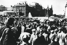 Crowds around a downed German bomber on display in Sverdlov Square, Moscow, 1941. Artist: Unknown
