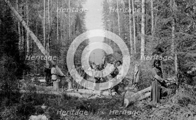 Shoria Men and Women Working on Cutting in the Woods, 1913. Creator: GI Ivanov.