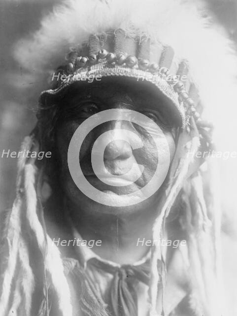 Red Hawk (Che-tan Luta)-Oglala, c1907. Creator: Edward Sheriff Curtis.