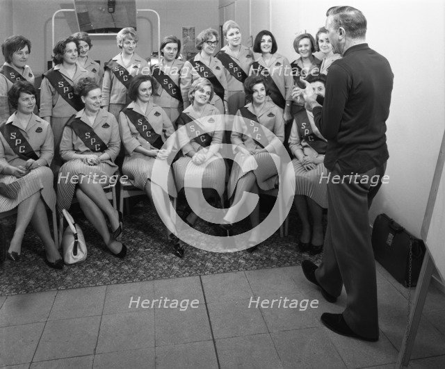 Australian sales girls with SPL sashes listen to a sales talk, Selby, North Yorkshire, 1965. Artist: Michael Walters