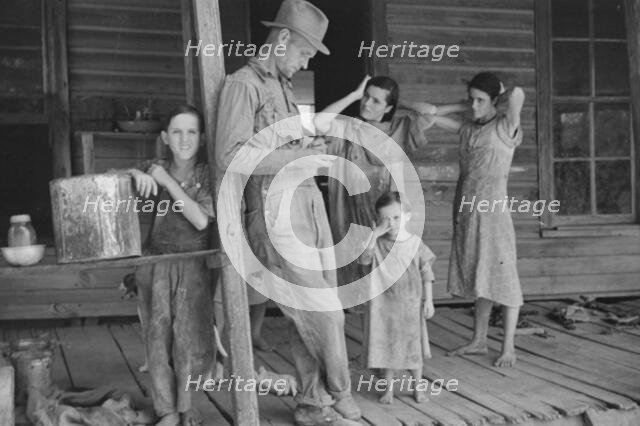Floyd Burroughs and Tengle children, Hale County, Alabama, 1936. Creator: Walker Evans.