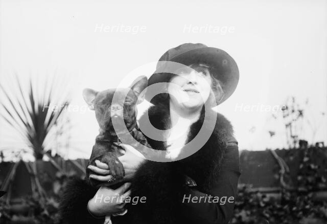 Mrs. Malcolm Strauss & "Beaux Attos" [i.e., Athos], between c1910 and c1915. Creator: Bain News Service.