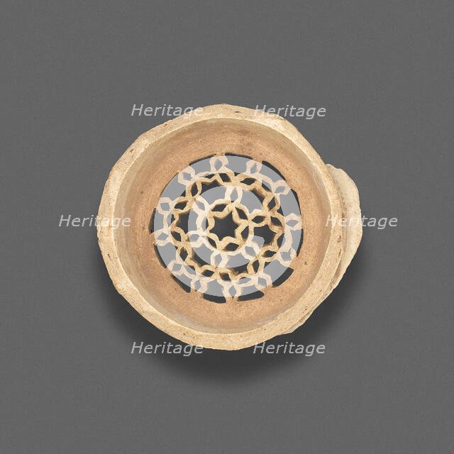 Clay filter with geometric design, Fatimid dynasty (969-1171), 11th-12th century. Creator: Unknown.