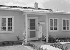 Resident nurse and clinic, FSA camp, Farmersville, Tulare County, California, 1939. Creator: Dorothea Lange.