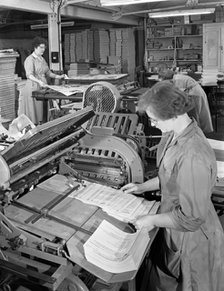 A folding machine in a printworks, Mexborough, South Yorkshire, 1959. Artist: Michael Walters