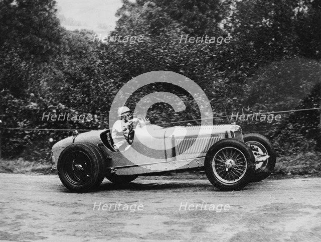 Kay Petre driving a Riley, Autumn Hill Climb, Shelsley Walsh, Worcestershire, 1935. Artist: Unknown