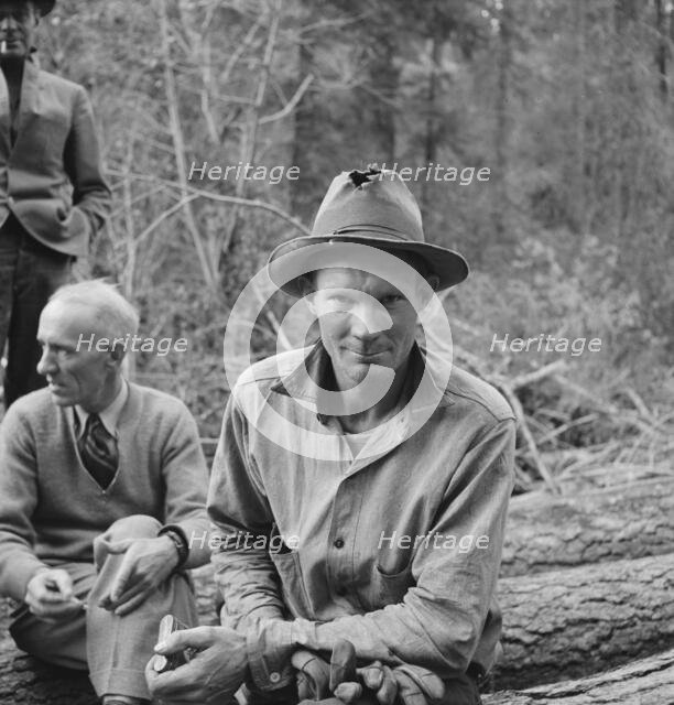 Member of the co-op in the woods, Ola self help cooperative sawmill, Gem County, Idaho, 1939. Creator: Dorothea Lange.