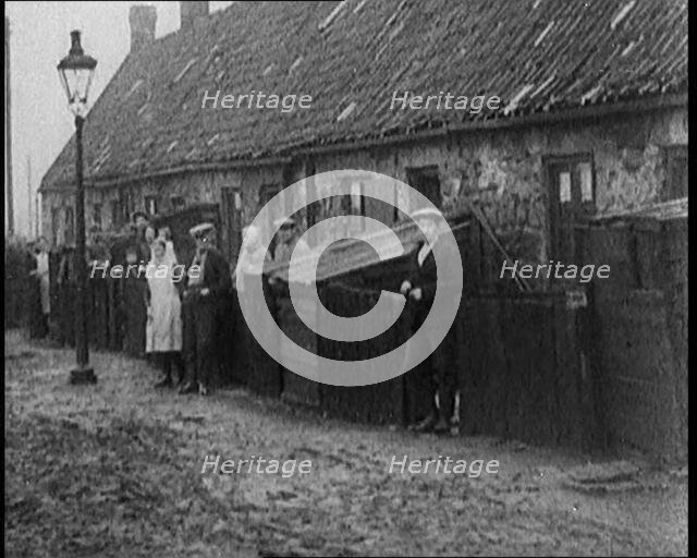 Prince Edward, Prince of Wales Inspecting Working Class Homes in the North of England, 1929. Creator: British Pathe Ltd.