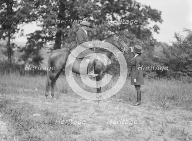 Bruce, J.M., Mr., on horseback, with Mrs. Bruce, 1919 May 30. Creator: Arnold Genthe.