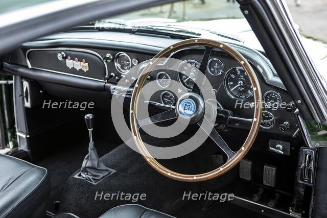 Steering wheel and dashboard of a 1961 Aston Martin DB4 GT previously owned by Donald Campbell. Creator: Unknown.