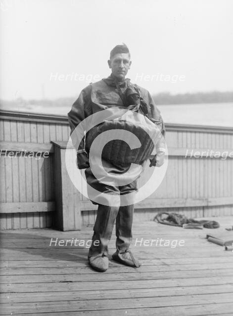 Life Saving Suit Worn By T. Aud, 1916. Creator: Harris & Ewing.