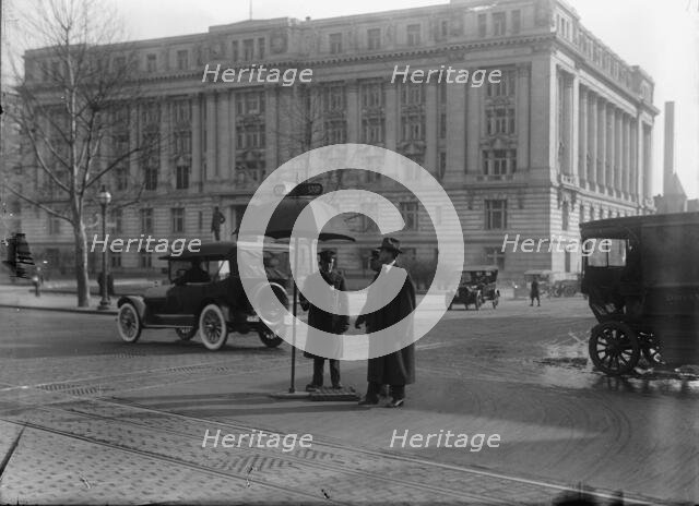 District of Columbia; Traffic. Stop And Go Signs, 1913. Creator: Harris & Ewing.