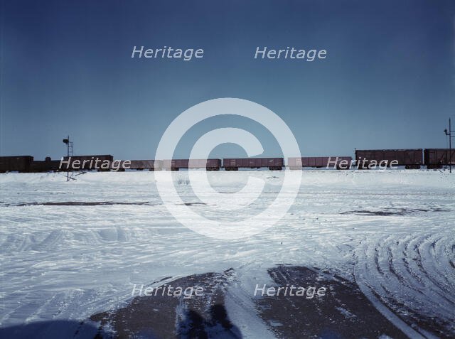 Train going over the hump at C & NW RR's Proviso yard, Chicago, Ill., 1942. Creator: Jack Delano.