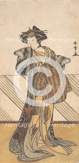 The Fourth Iwai Hanshiro as a Courtesan Dressed in a Pink Kimono, ca. 1778. Creator: Shunsho.