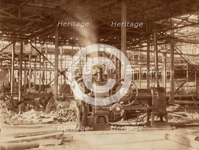 Steam Engine near the Grand Transept, Crystal Palace, 1851. Creator: Philip Henry Delamotte.