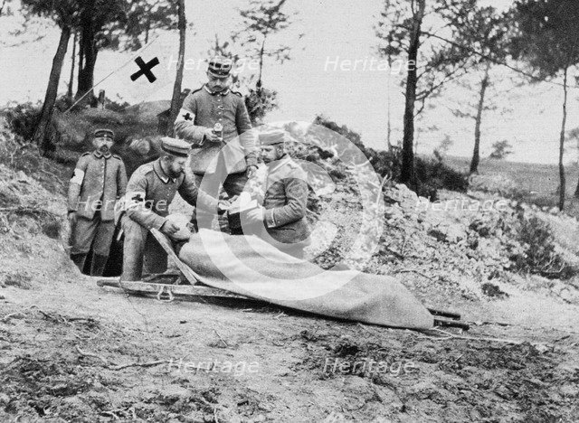 A wounded German soldier at a dressing station, World War I, 1915. Artist: Unknown