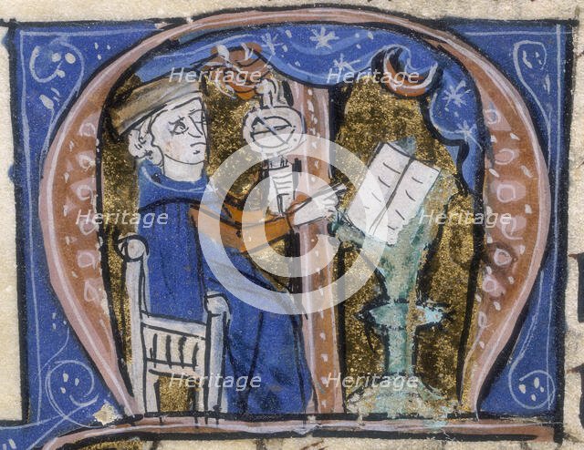 An astrologer at work with his book and an armillary, early 14th century. Creator: Unknown.