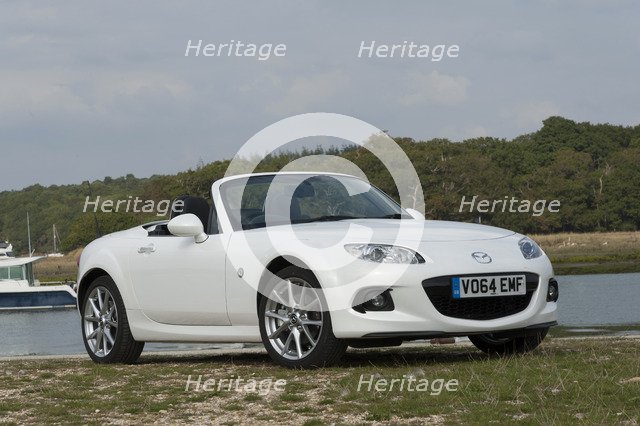 2014 Mazda MX5 Roadster Coupe Artist: Unknown.