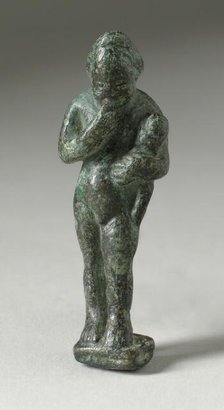 Figurine of a Standing Naked Man Holding a Baby, Ptolemaic Period-early Roman Period 200 BCE-100 CE. Creator: Unknown.
