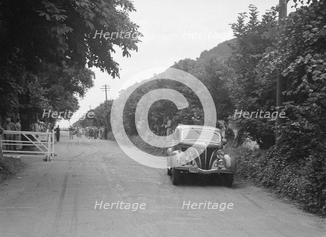 GM Denton's Ford V8, winner of a bronze award at the MCC Torquay Rally, July 1937. Artist: Bill Brunell.