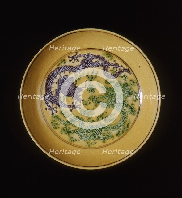 Green and aubergine dragons on yellow ground saucer, Guangxu period, Qing dynasty, China, 1875-1908. Artist: Unknown